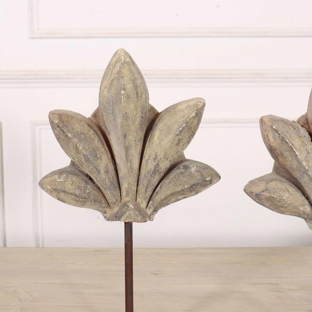 Pair of early 20th C stone fragments on stand.1900 This piece is designed in the style of the selected designer and/or...