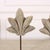 Pair of early 20th C stone fragments on stand.1900 This piece is designed in the style of the selected designer and/or...