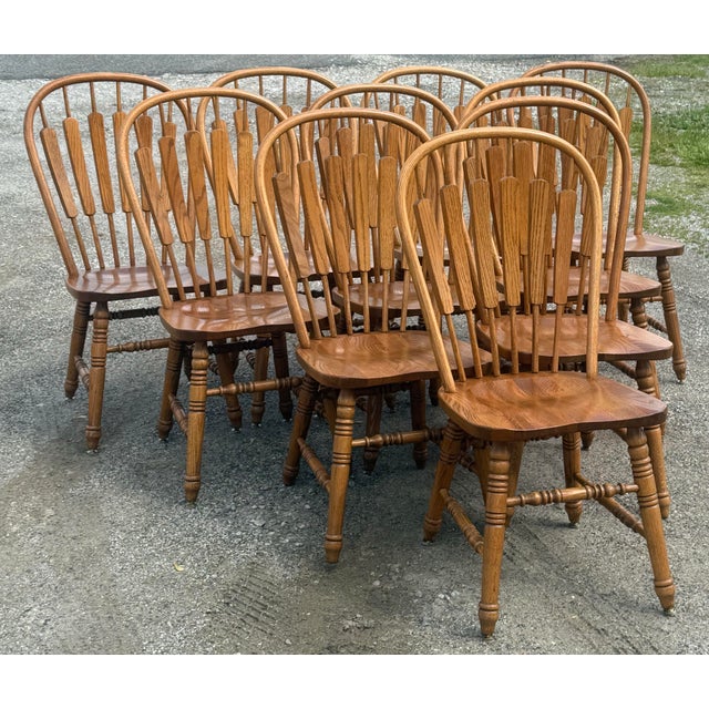 Rare set of 10 timeless dining chairs by Richardson brothers. Meticulously crafted in the USA of solid oak. Features flat...