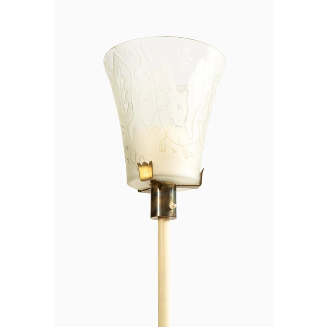Very rare floor lamp designed by Bo Notini. Produced by Glössner & Co. in Sweden. This piece is attributed to the...