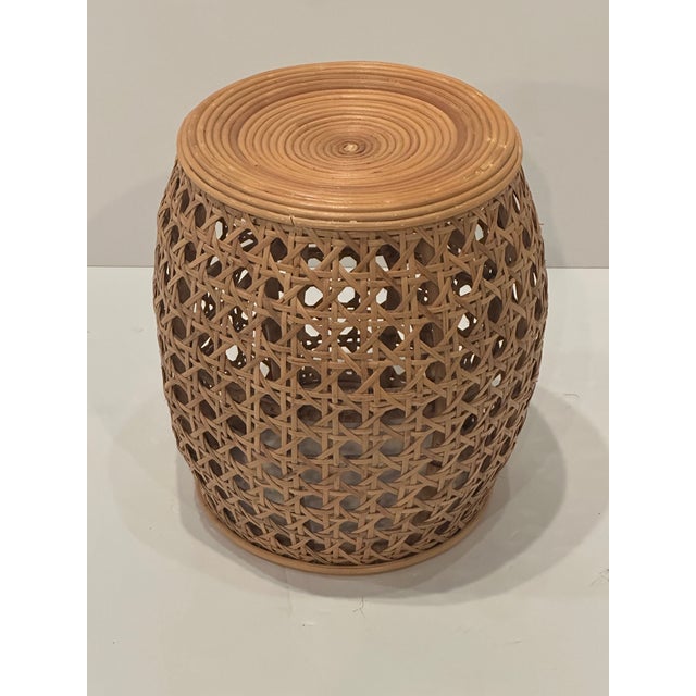 Stylish rattan and caned round garden seat drinks table, perfect for your beachfront getaway.