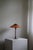 Rare table lamp by niels rasmusen thykier, model ''t3” major. Frame and top of brass, fabric in oil-impregnated red/orange...