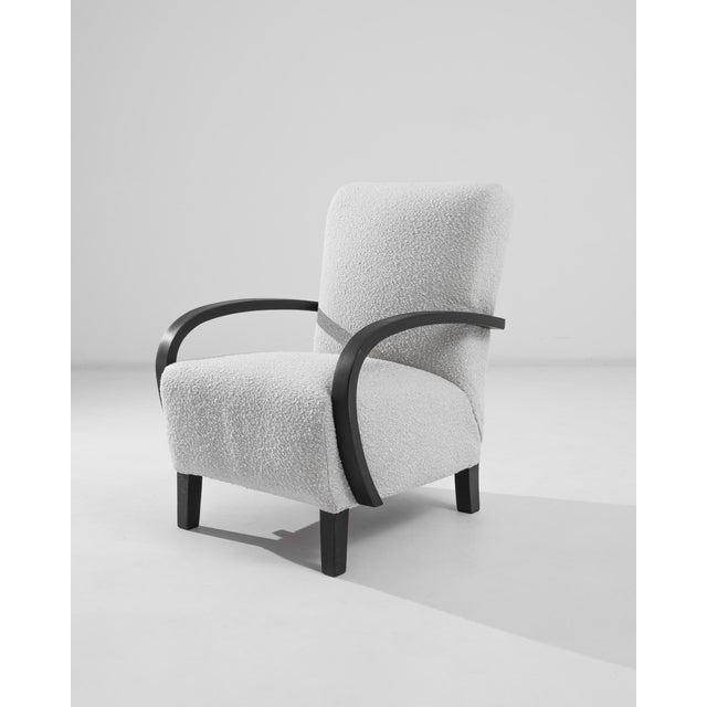 Introducing the 1950s Czech Wooden Armchair by esteemed designer J. Halabala. This iconic piece embodies the perfect blend...