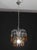 Set of 2 Gorgeous Murano chandelier in the style of Venini's La Cascata. The nickel-plated silver crown-shaped frame has...