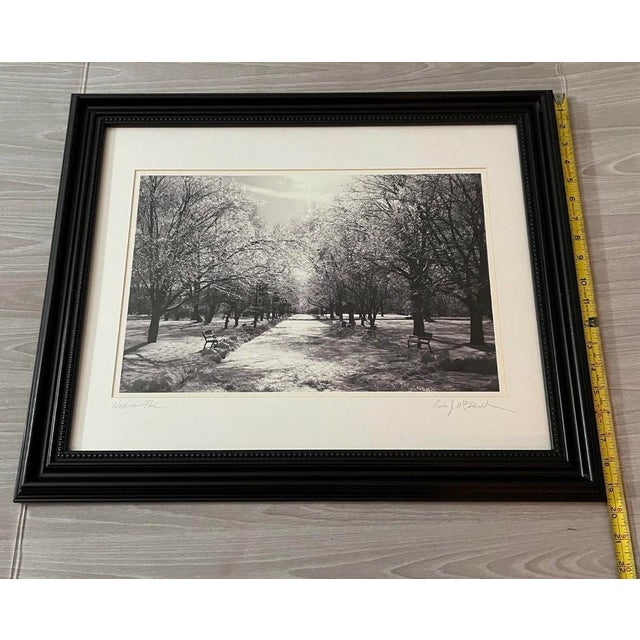 Beautiful signed gelatin silver photograph titled Washington Park by Anita MacDonald. This black-and-white winter...