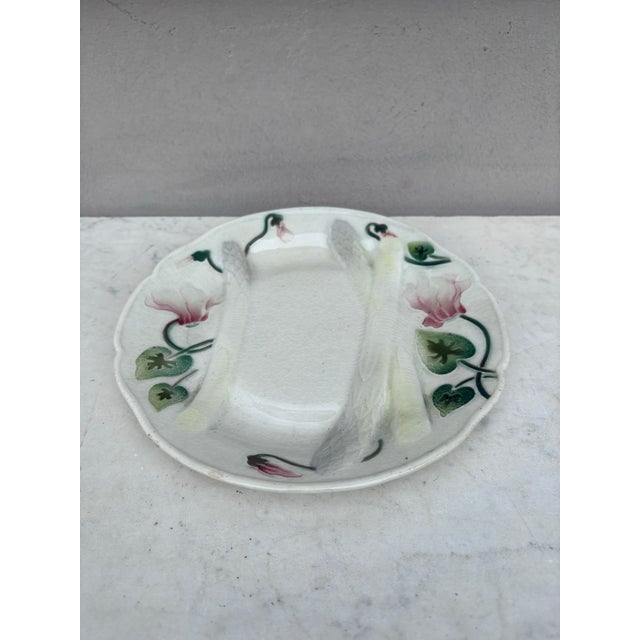 Majolica Art Nouveau asparagus plate with cyclamens signed Keller et Guerin Saint Clement. Every important French...