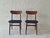 Finely constructed pair of 1960s Danish dining chairs in solid teak, seats recently re-covered with a structured navy blue...