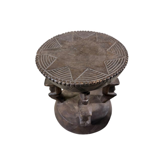 Superb and rare to find hand carved milk stool from a single piece of wood by the Dogon Tribe of Mali, The stool's...