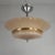 An elegant art deco pendant lamp featuring a beautiful cloudy glass shade, finished with a refined gold band. the cloudy...