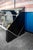 Sideboard - bar cabinet in lacquered wood and steel, with smoked glass doors. Napoleone model Designer Claudio Salocchi...