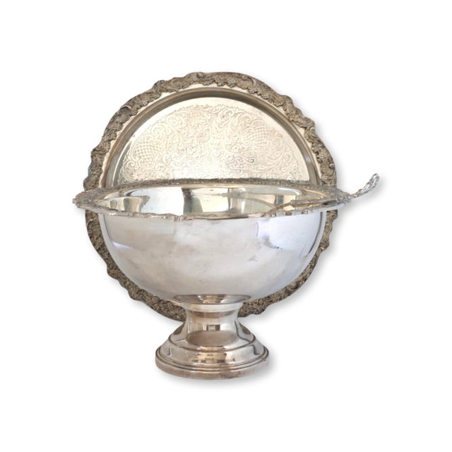 Large midcentury silver plate beverage cooler by Rogers, offered with its original tray and matching ladle. The surface...