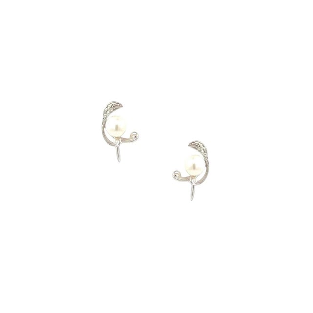 Mikimoto Estate Akoya Pearl Clip-On Earrings Sterling Silver 6.19 mm 3.20 Grams M435 These elegant Authentic Mikimoto...
