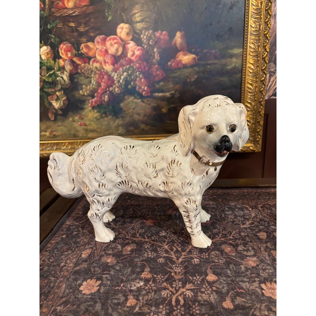 A charming and unusually large pair of Scottish Bo’ness-style pottery “Wally Dogs”, modeled as spaniels standing on all...