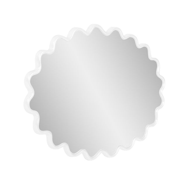 The Cloud Mirror features a wavy frame that is meticulously hand-painted in the USA. This mirror is designed to complement...