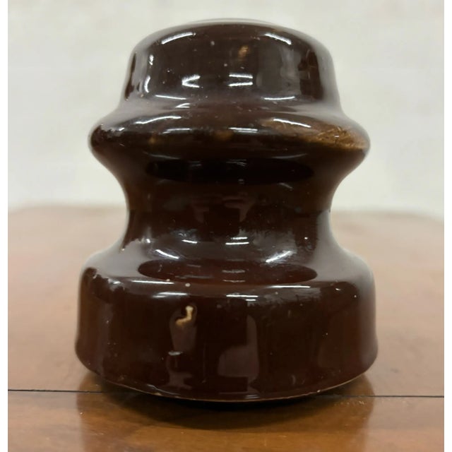 This is a gorgeous antique brown ceramic glazed insulator with a few chips as pictured. Dimensions. - 3.25 in wide - 3.25...