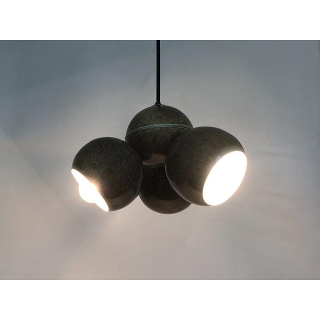 Chandelier with 3 ball lights in glazed sandstone. 50s 60s Stilnovo Italy Magnificent Italian Stilnovo chandelier composed...