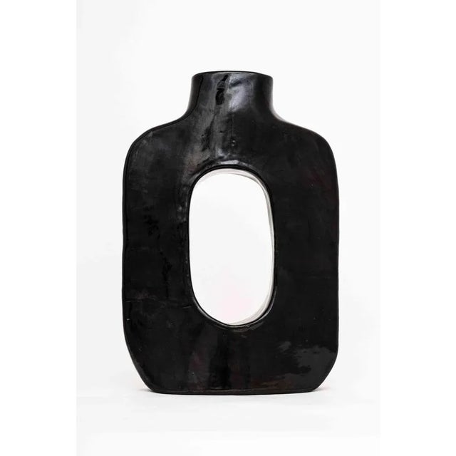 The big 0 is a shaped vase in hand. Signed by Maker,Stamped by Maker,Imprinted by Maker,Numbered