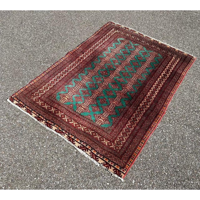 Middle Eastern hand-knotted wool and silk rug from the 70s