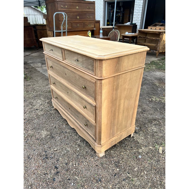 Elegant and timeless, this authentic 19th-century French Louis Philippe commode is crafted from beautiful walnut and...