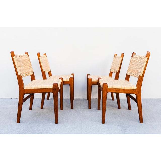 An expertly restored set of four CH 31 dining chairs in teak by Hans Wegner, made in Denmark by Carl Hansen & Son c....