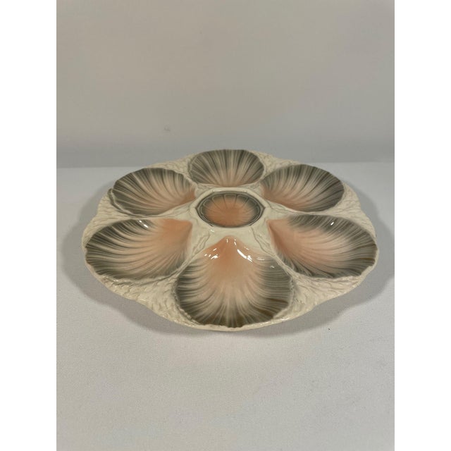A stunning hand crafted ceramic Majolica Sarreguemines Oyster Plate made in northern France. Circa 1920s. Maker's marks...