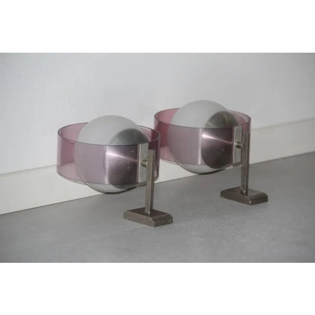 This pair of Minimalist wall sconces was produced Stilux Milano. Up to 250V (Europe/UK Standard).The wiring of this item...