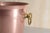 This classic copper-plated metal ice bucket embodies the timeless elegance of traditional bar accessories. Its clean lines...