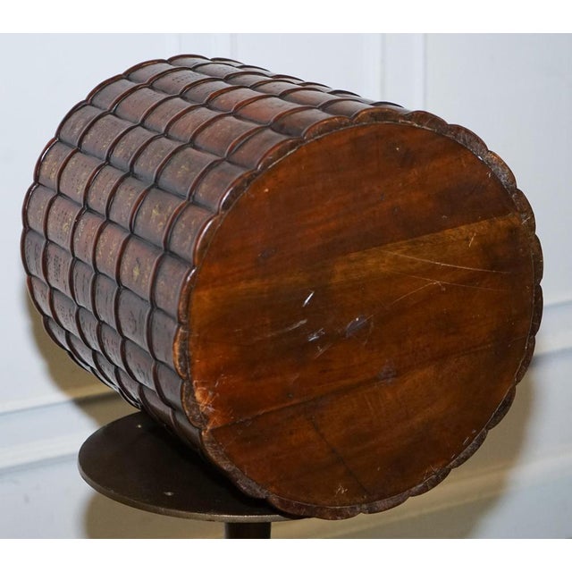 Vintage Theodore Alexander Leather Faux Book Waste Basket. It is an elegant office bin designed to resemble a vintage...