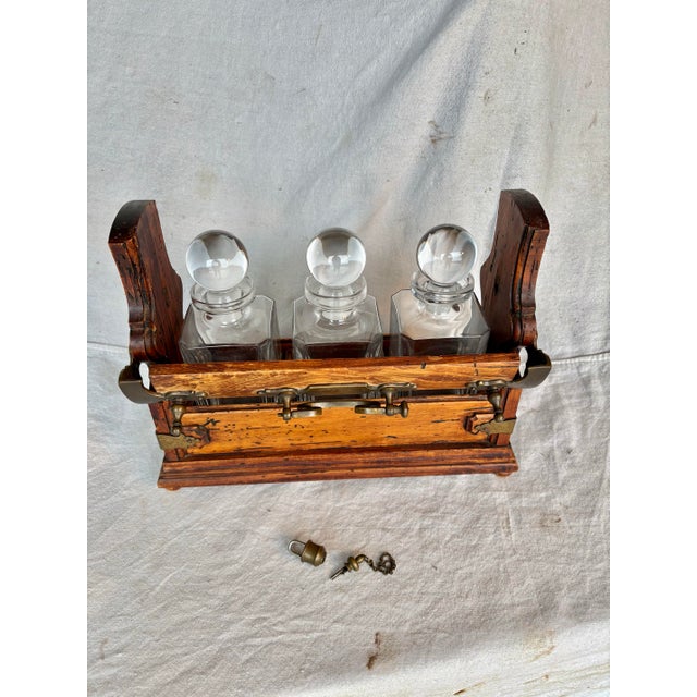 Brown Early 20th Century English Oak Three Decanter Tantalus For Sale - Image 8 of 12