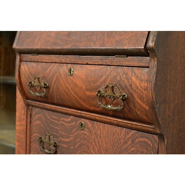 Early Baker Furniture Antique Victorian Carved Tiger Oak Side-by-Side Bookcase With Drop Front Secretary Desk, Circa 1900 For Sale - Image 11 of 17