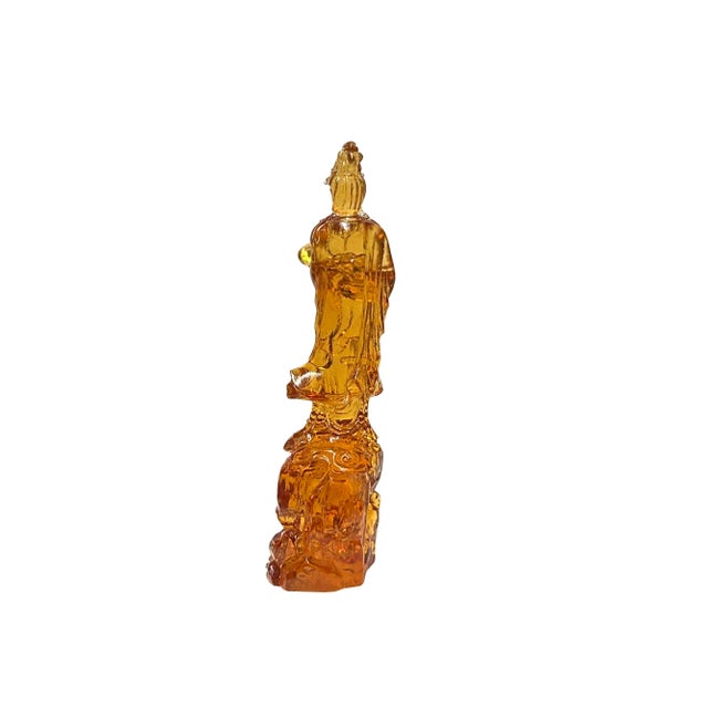 The Orange Crystal Glass Standing Ru Yi Bodhisattva Kwan Yin Statue is a breathtaking piece of art that exudes elegance...