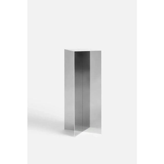 Nm03 podium by nm3 dimensions: w 30 x d 30 x h 90 cm materials: ba stainless steel 3mm stainless steel, dry joint, podium....