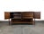 An iconic example of American mid-century modern design, this walnut console from Broyhill’s celebrated Brasilia...