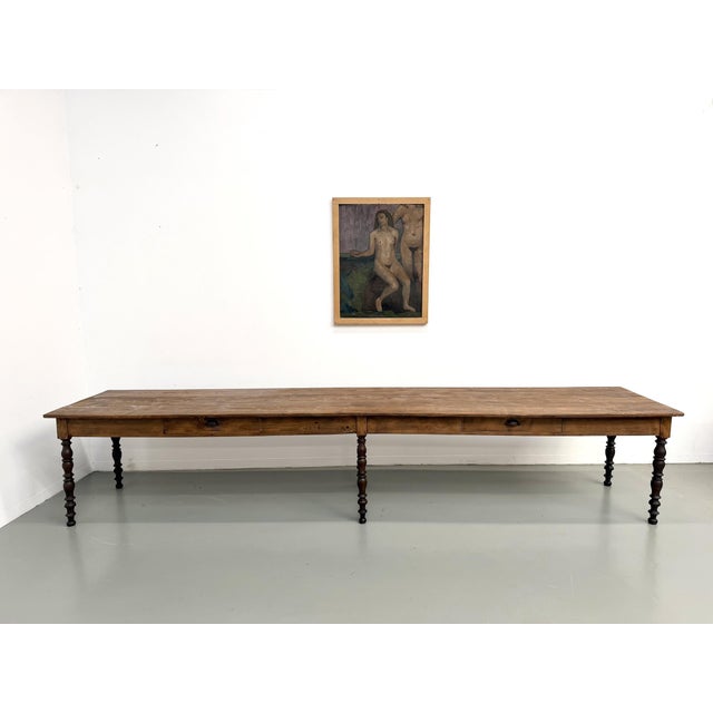 Large French farmhouse table in solid pine, dating from around 1900. Nearly 4 meters long and 80 cm deep, tables of this...