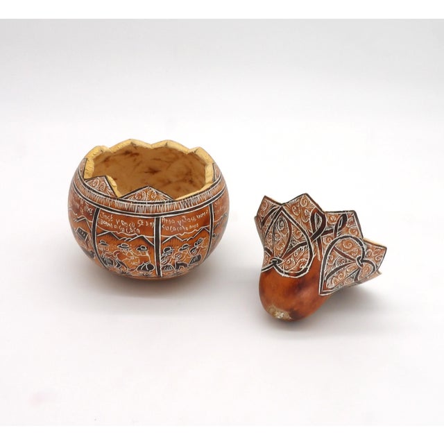 This hand-crafted mate burilado carved gourd art is from the Huancayo/Mantaro Valley region of the Peruvian Andes. The...