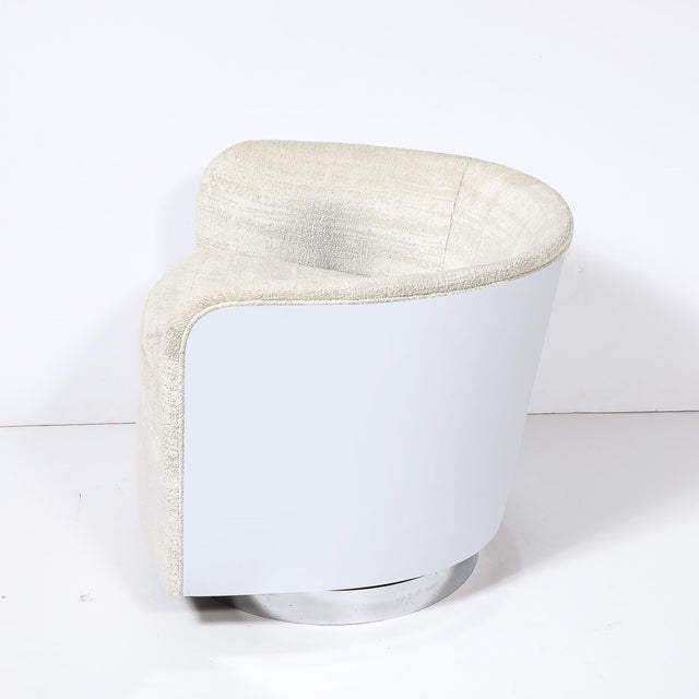 This Mid-Century Modernist swivel club chair, designed by the renowned Milo Baughman circa 1970, exemplifies the...