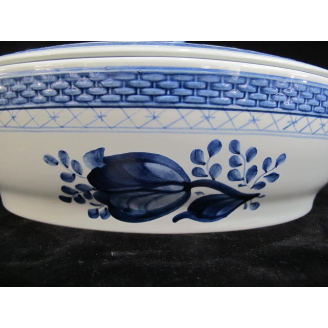 Royal Copenhagen, Denmark, Aluminia Faience Tranquebar blue pattern oval tureen with lid. Blue tulip framed by basket...