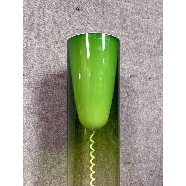 "Tobbe" floor lamp by Cartel, made of acrylic glass Sculpted handle for easy carrying Green opaline glass Dimensions: H172...