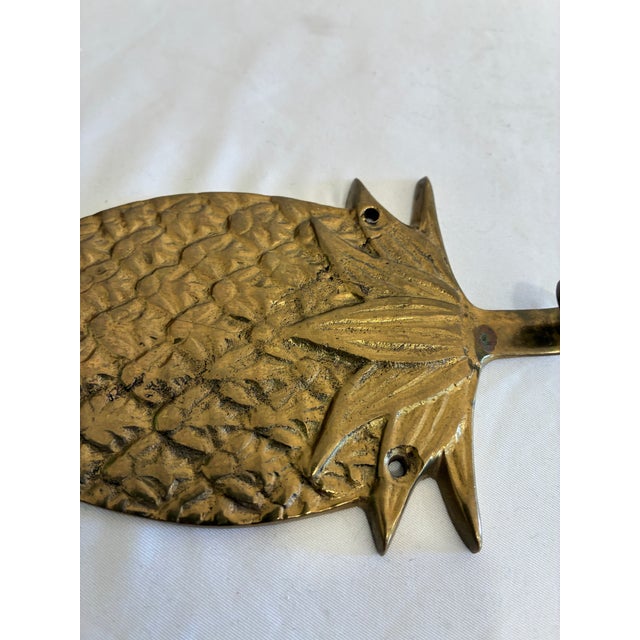 A vintage pineapple wall hook in solid brass, marked “PWF Solid Brass India” on the back. Its raised texture, warm finish,...