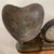The Antique Peerless Company Cast Iron Counter Scale, stamped March 1837, is a rare and valuable piece of history from the...