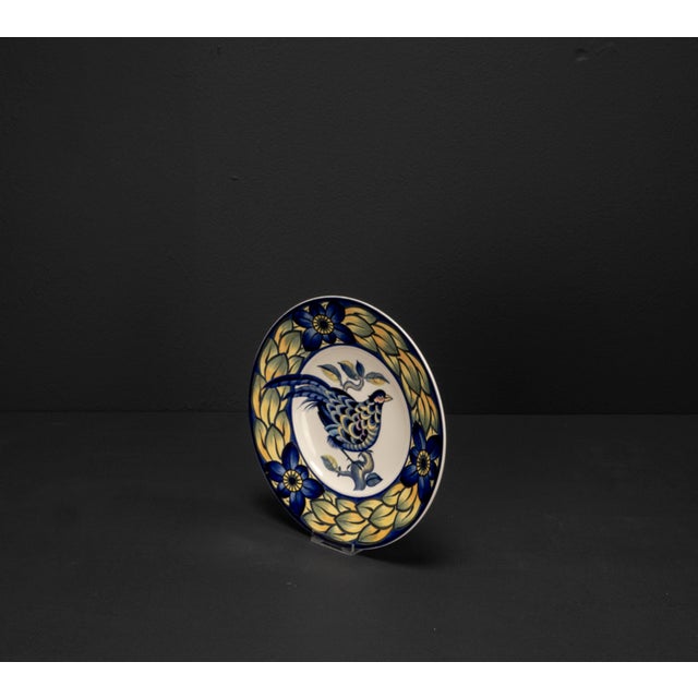 A stunning piece of tableware from the renowned danish manufacturer royal copenhagen aluminia, crafted in the signature...