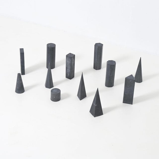 This nice set of 12 zinc geometric models are original of the 1940s. They used to help artists and students render...