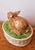 Circa 1980s, this is a signed Fitz & Floyd bunny rabbit lidded tureen. It features a hand-painted, glazed ceramic finish....