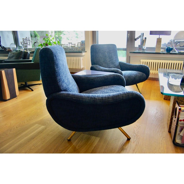 A beautiful pair of Lady armchairs, presented at the Milan Triennale in 1951 where they were an immediate success. This...