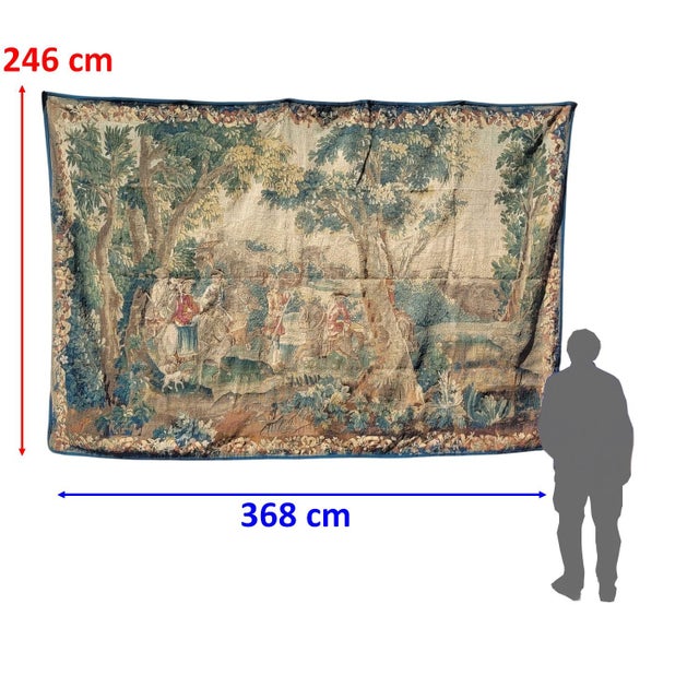 Important wool tapestry depicting a procession or gallant horseback ride: this elegant composition features a young woman...