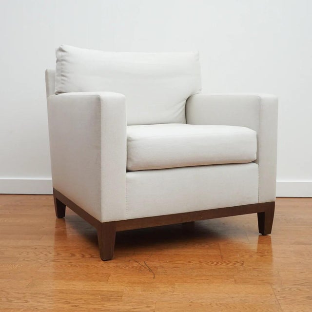Custom T-back club chair with mahogany stretcher and tapered legs finished in espresso mahogany. Shown in a classic wool...