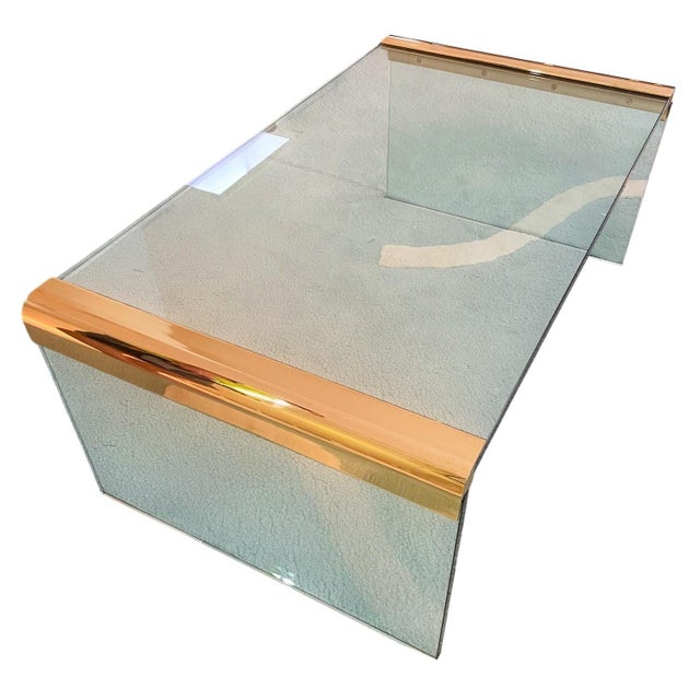 Leon Rosen for Pace Collection Brass & Glass Vintage Waterfall Coffee Table Dims: 43"W x 24"D 16"H This item is a Pace...
