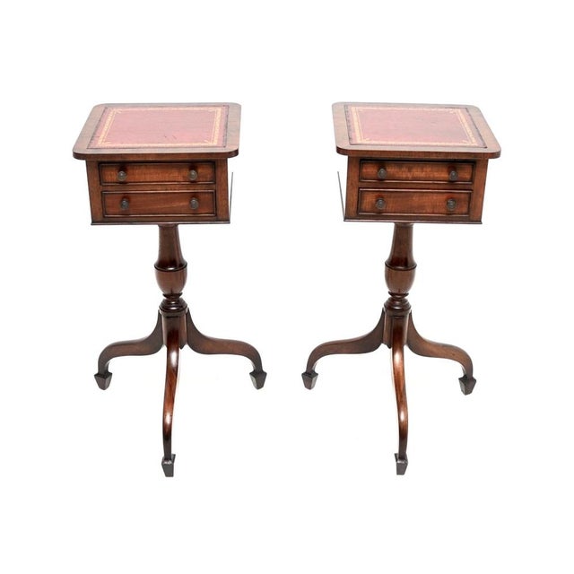 A lovely pair of antique leather top side tables. They were made in England, we would date them to around the 1930’s...