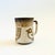 A mid century pottery mug. Lovely natural colored glazes with a scandinavian style bird design. Made in Japan, marked on...