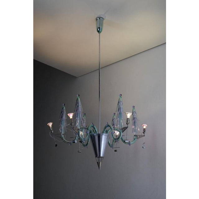 Gian Paolo Canova and Carlo Moretti Murano Glass Chandelier. This unique chandelier features 6 arms and is marked by Carlo...